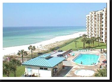 view of pool from condo balcony overlooking panama city beach