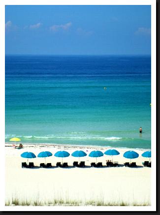 panama city beach with umbrellas