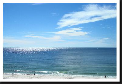 shimmering beach view from condo balcony at Moonspinner